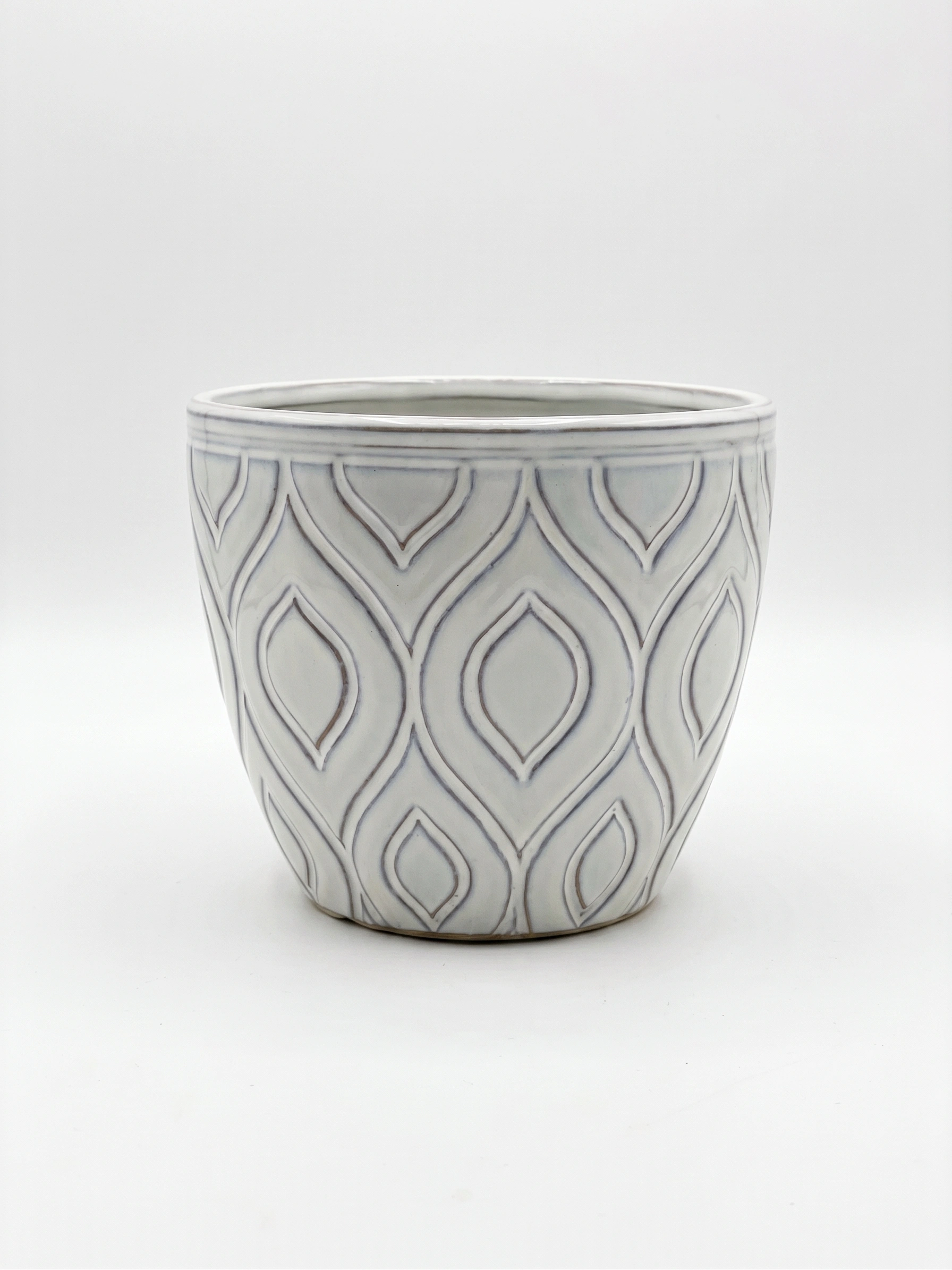 Light blue leaf pattern ceramic cover pot 17cm with embossed botanical design and soft glazed finish on white background