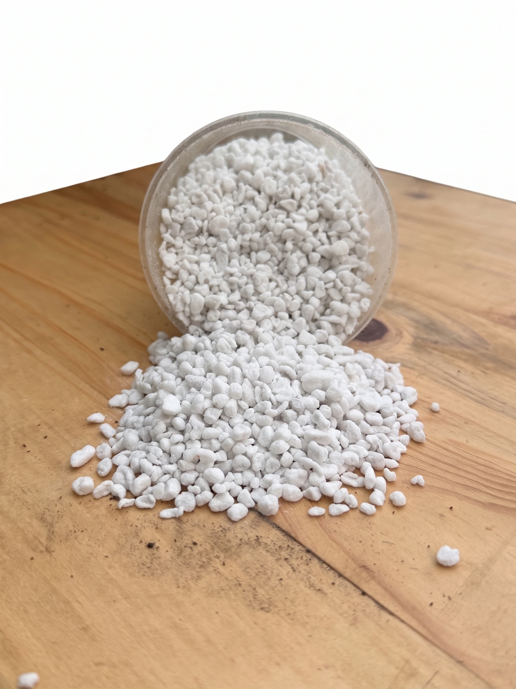 Perlite lightweight porous growing medium for drainage, root aeration and indoor plant mixes on white background
