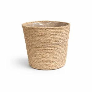 Large woven seagrass basket cover pot 29cm wide with natural woven finish and protective plastic liner on white background